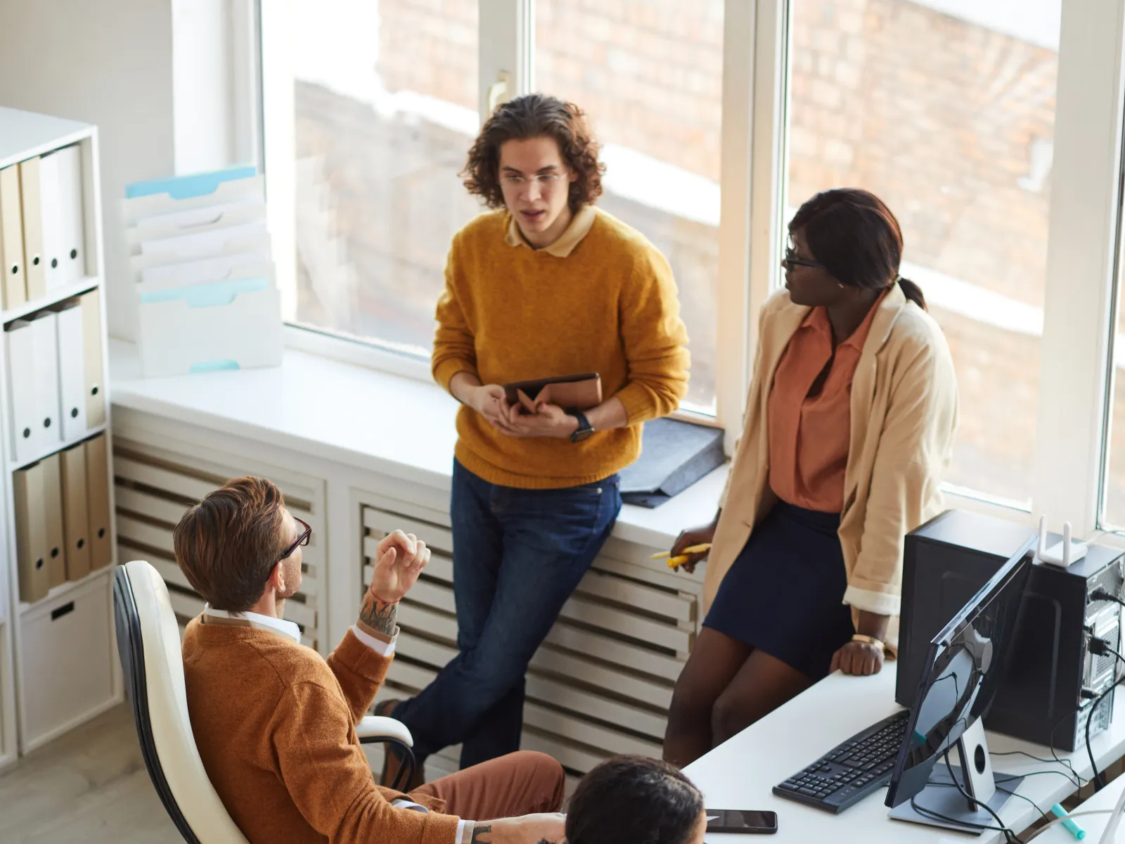 a group of people in an office