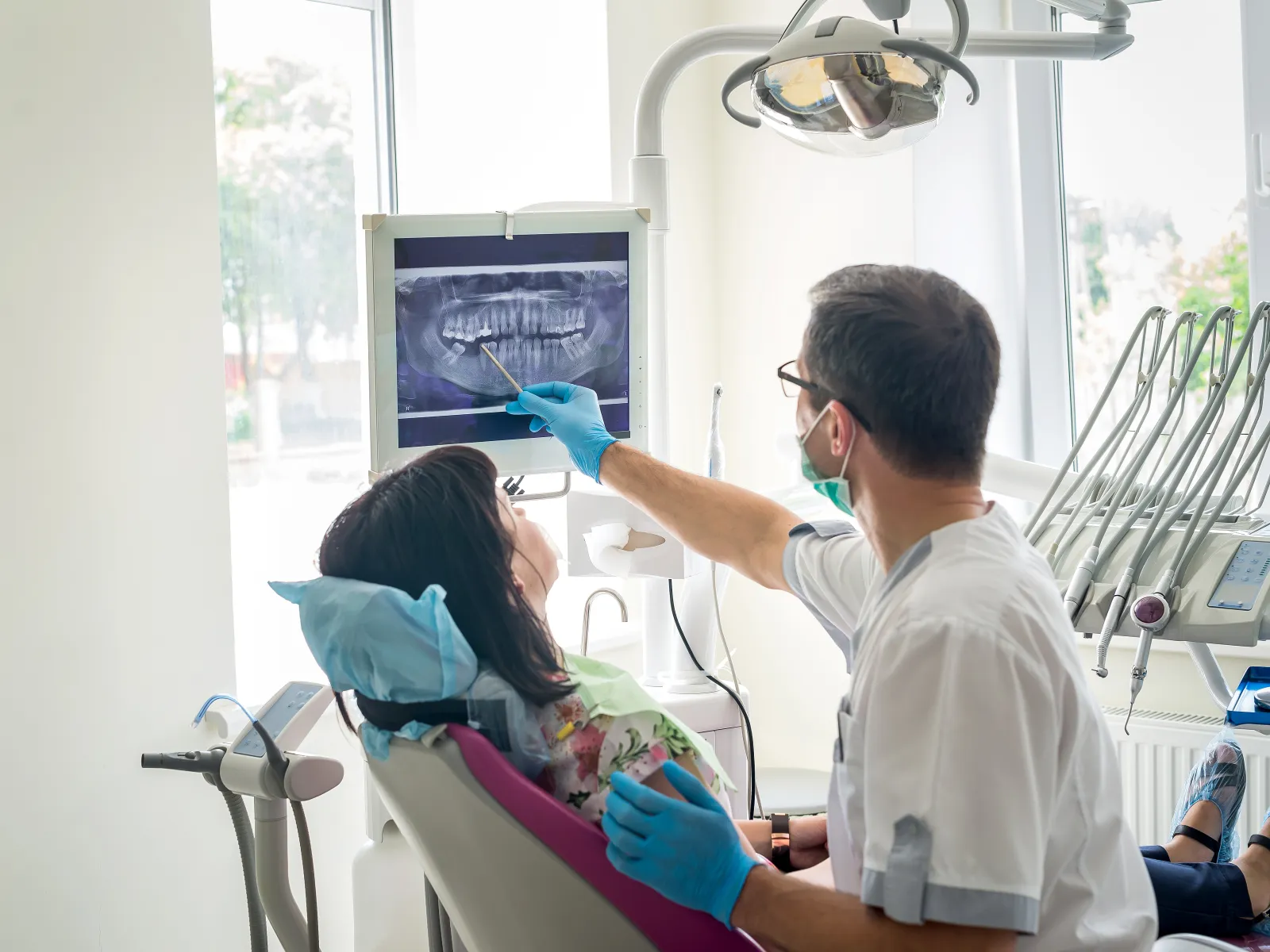 a doctor attending to a patient
