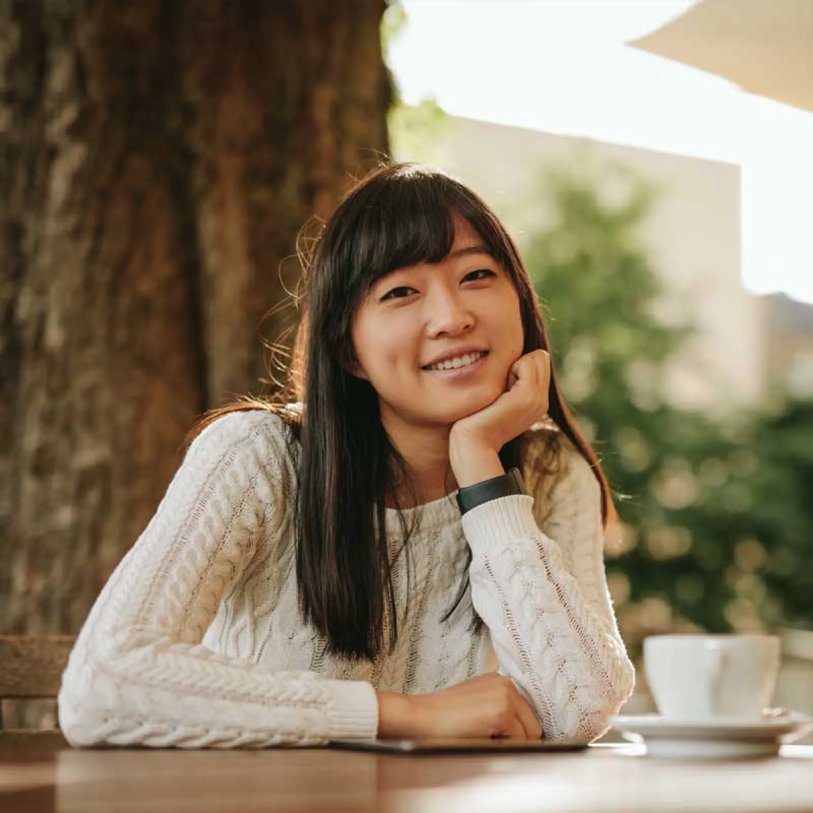 a woman sitting at a table