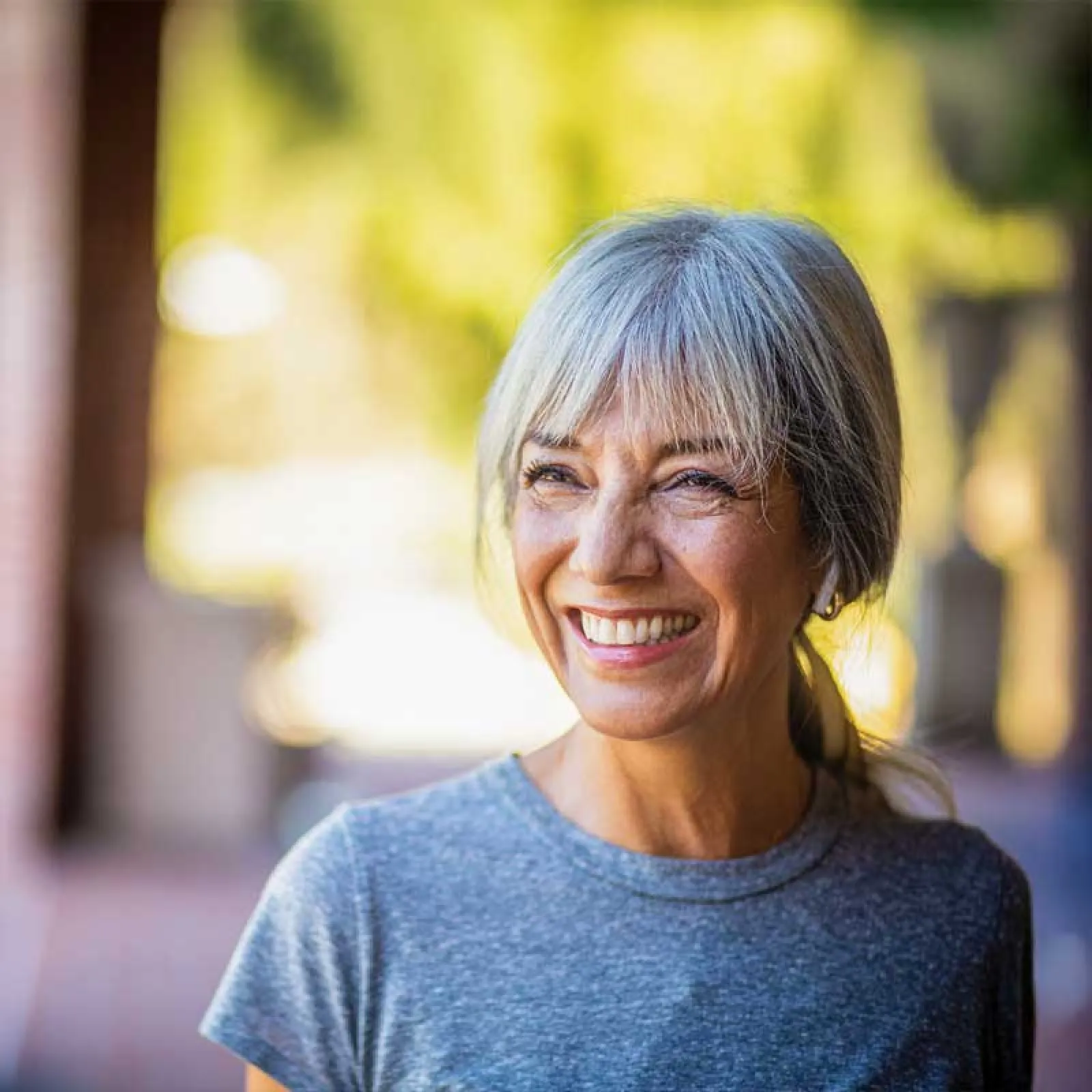 a woman smiling at the camera