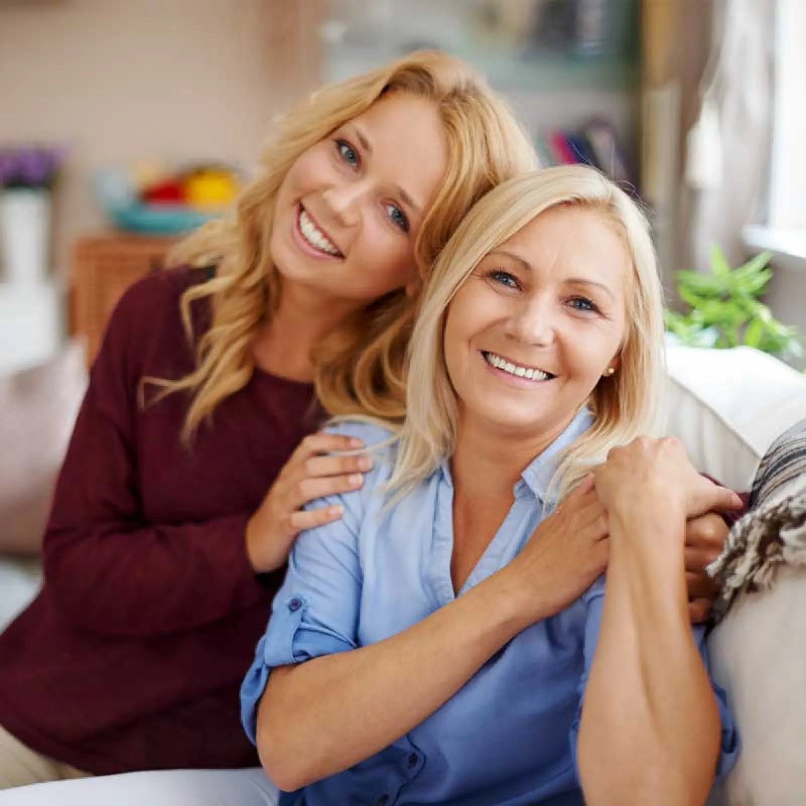 a couple of women smiling