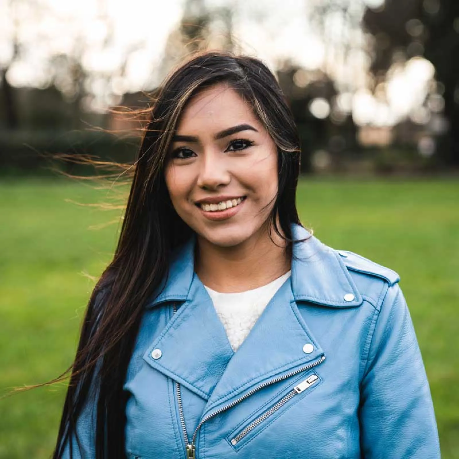 a woman smiling for the camera
