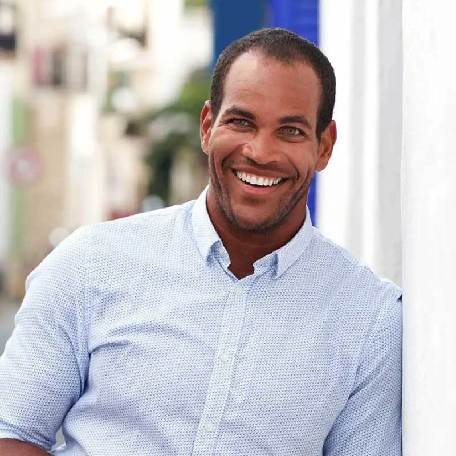 a man smiling for the camera