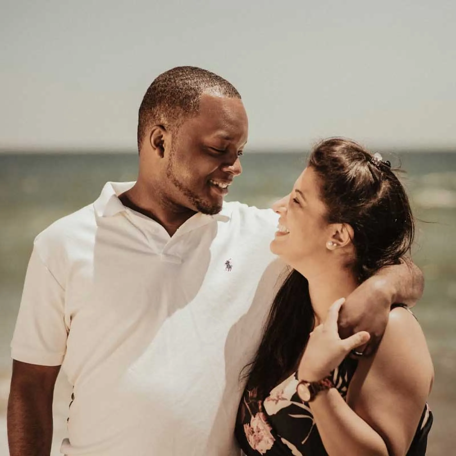 a man and woman kissing