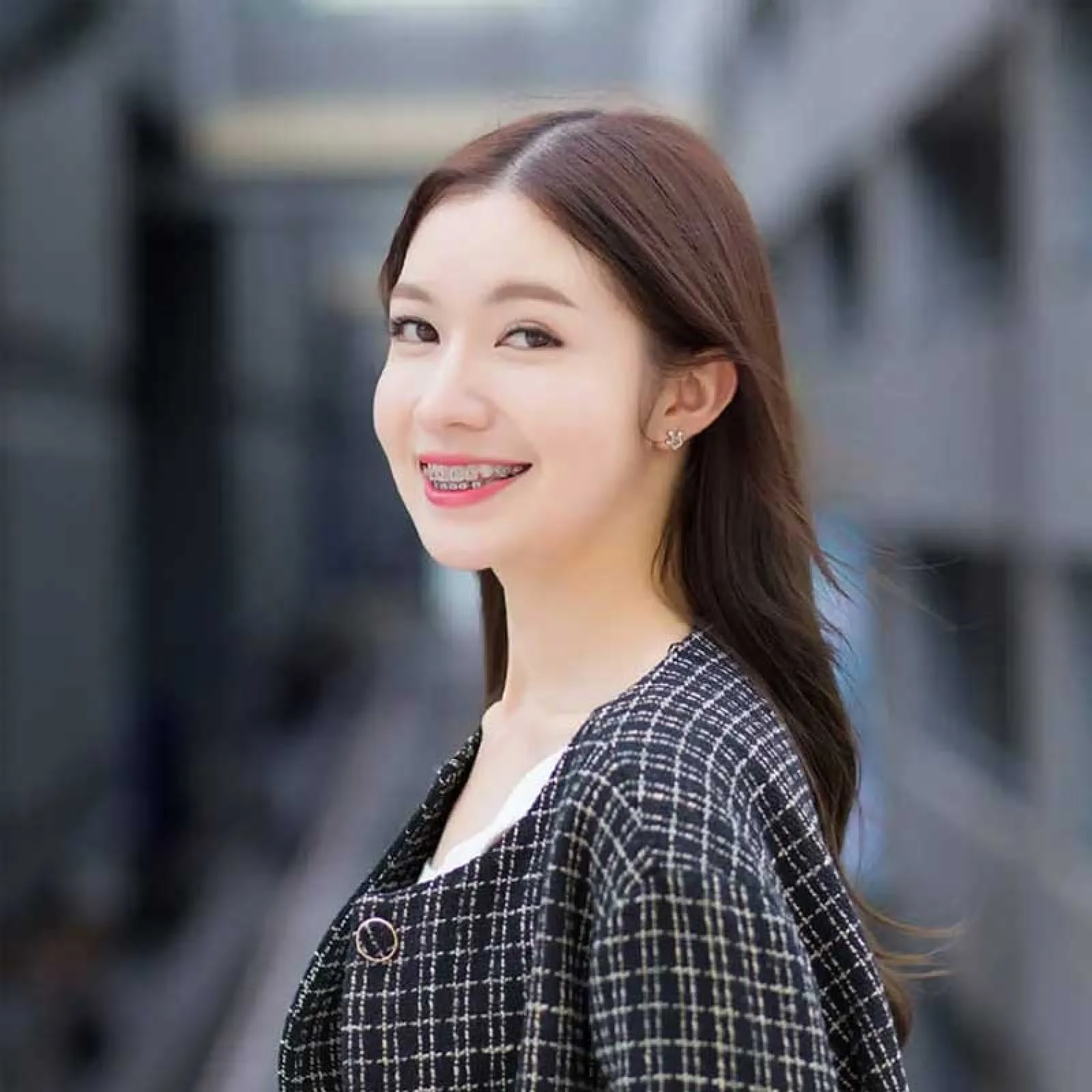 a woman smiling at the camera