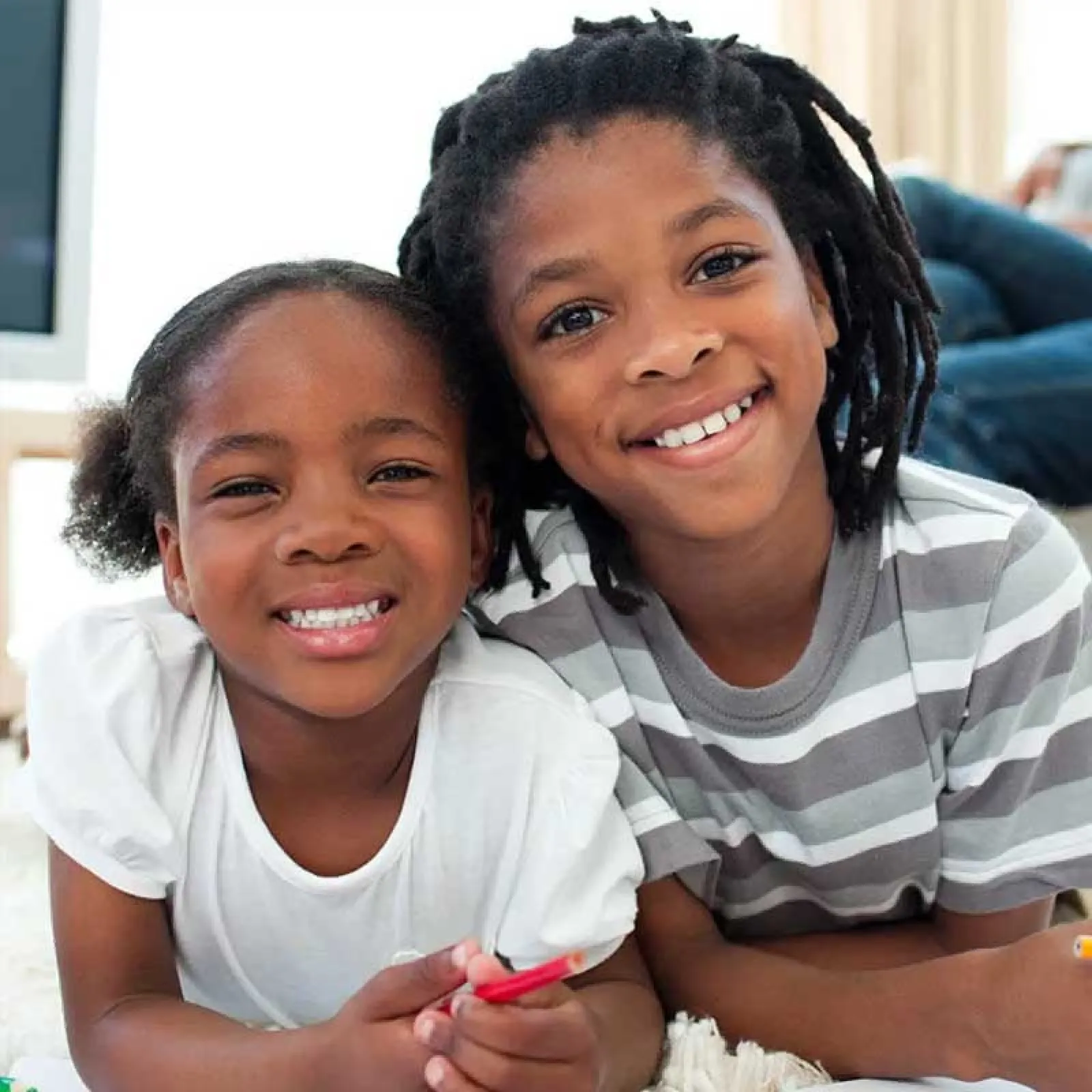 a person and a child smiling