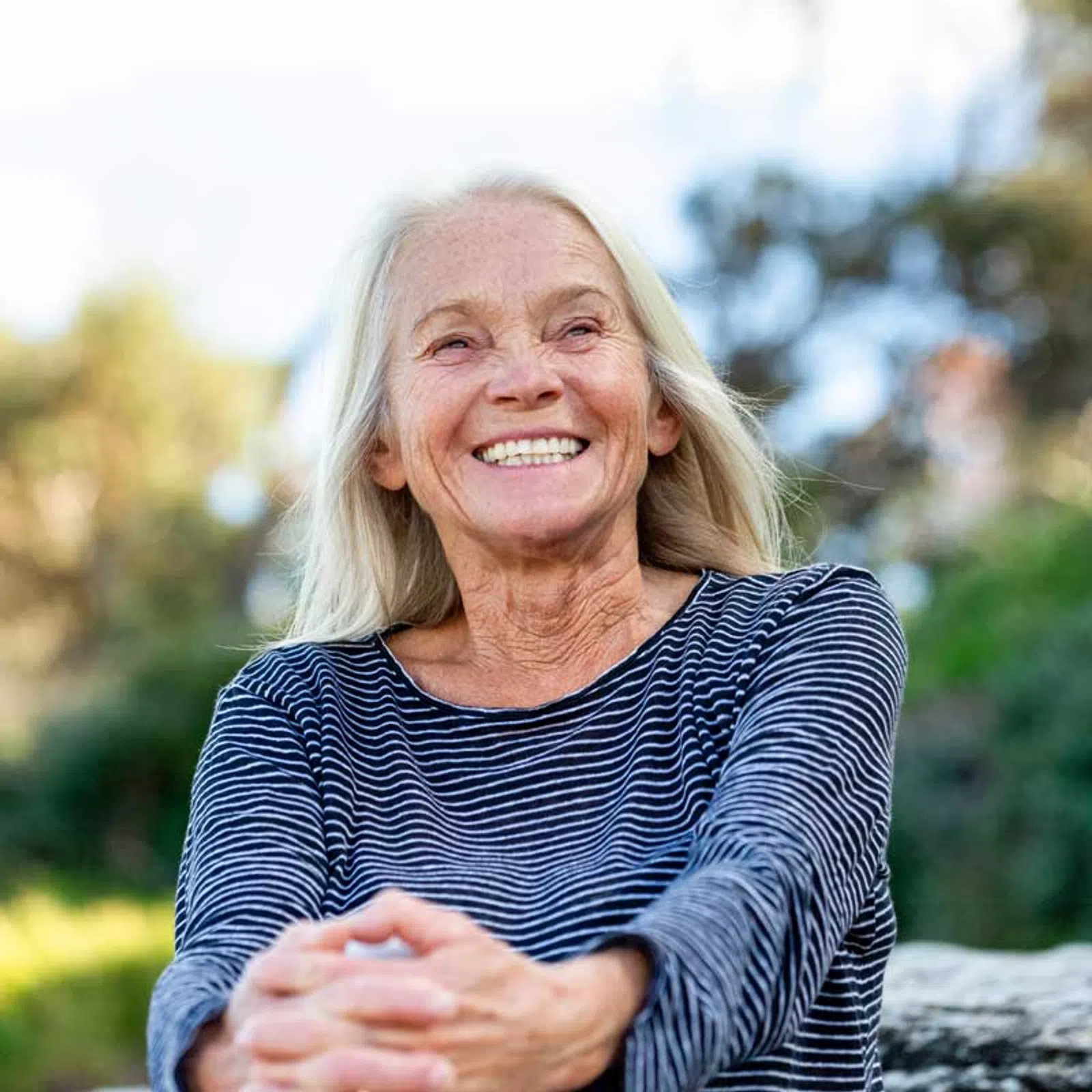 a woman with her arms crossed