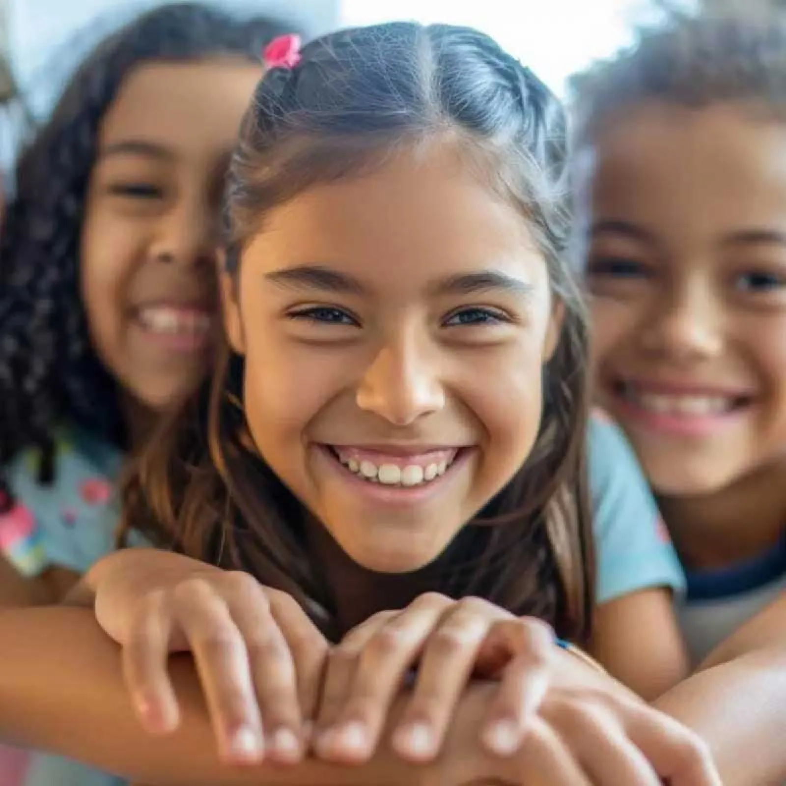 a group of girls smiling