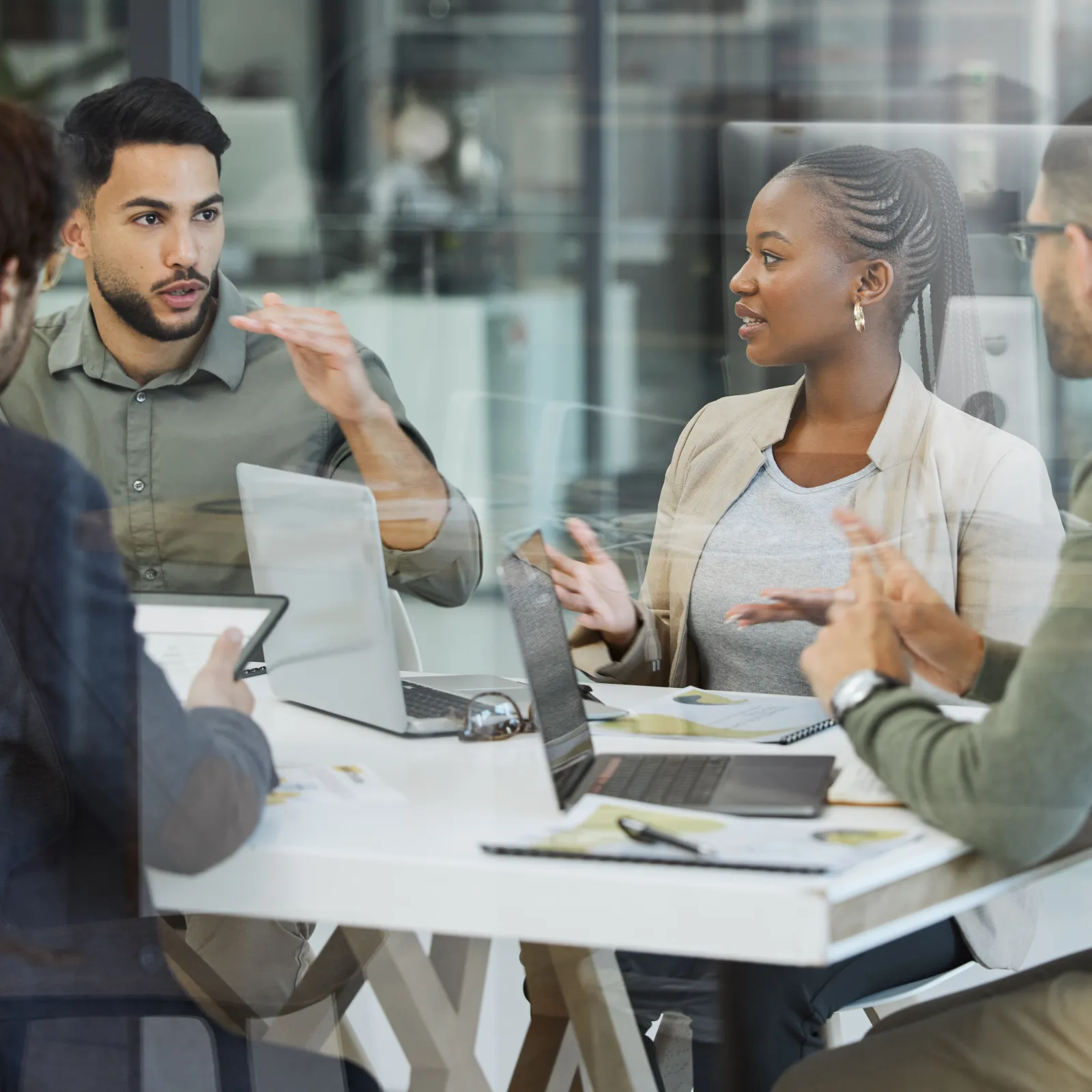 a group of people sitting around a table
