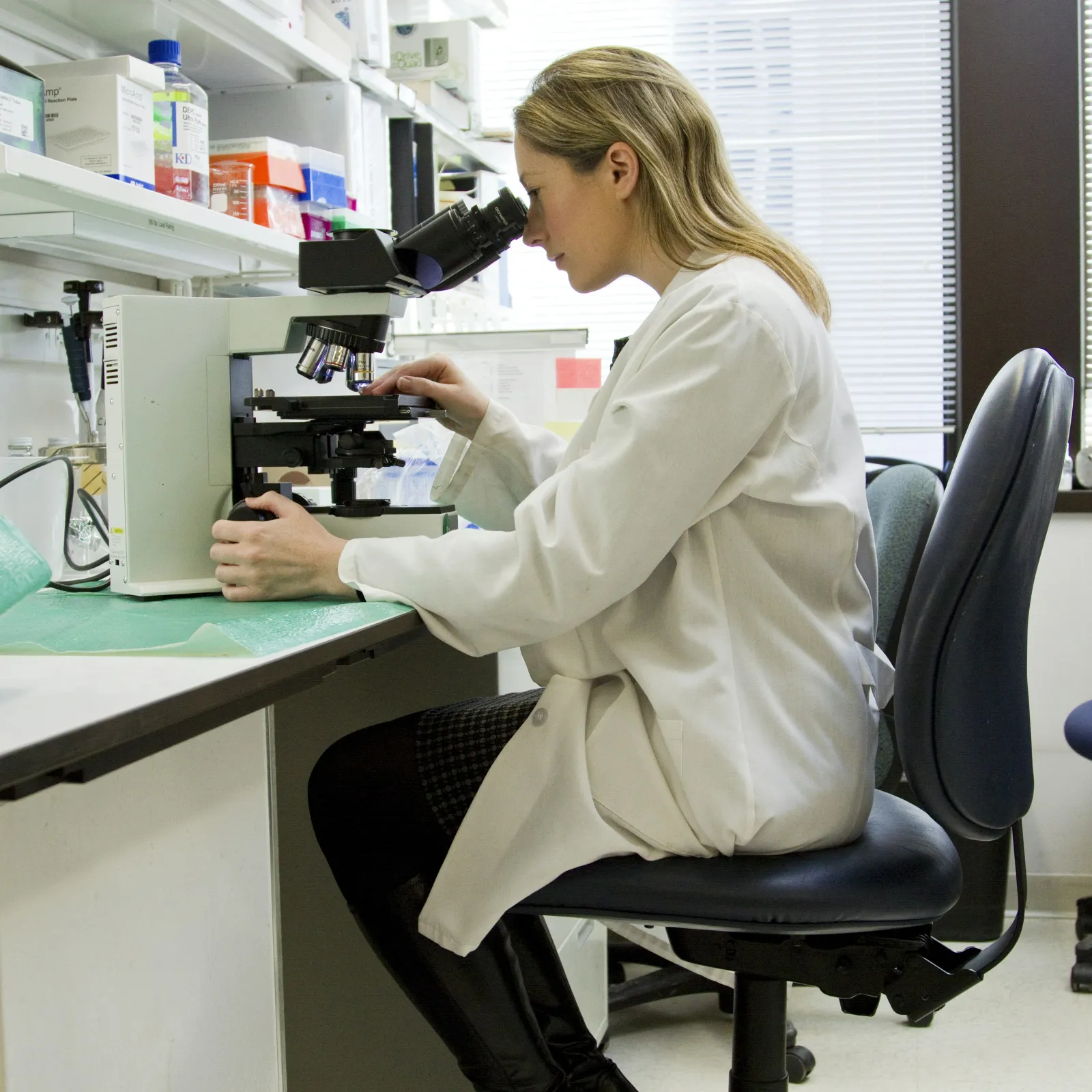 a person in a white coat