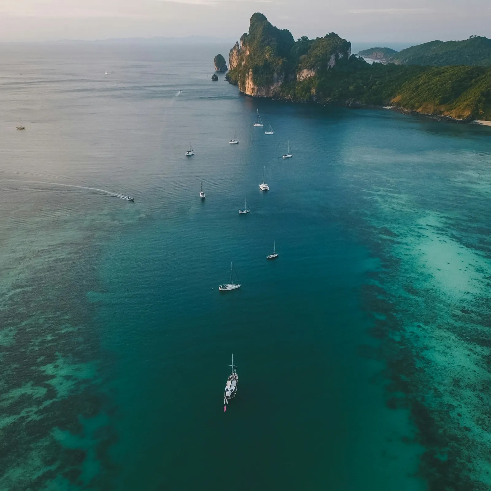 a group of boats in the water