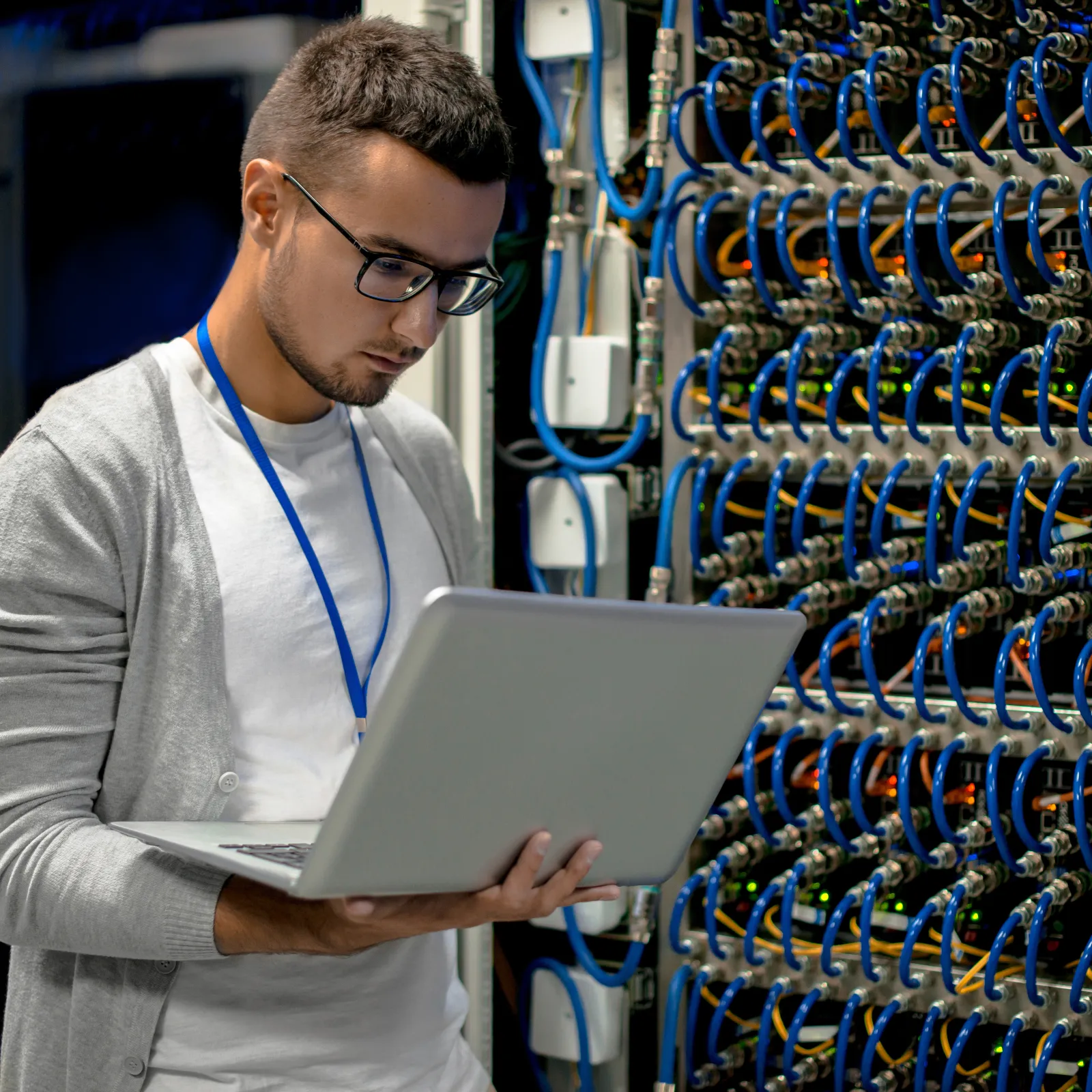 a man holding a laptop