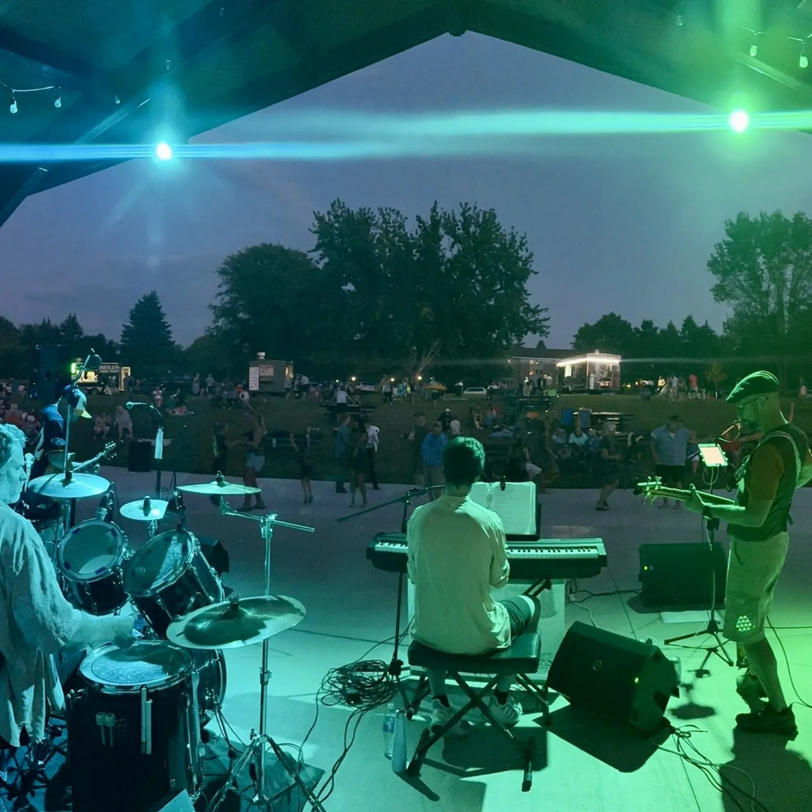 a band playing under a tent