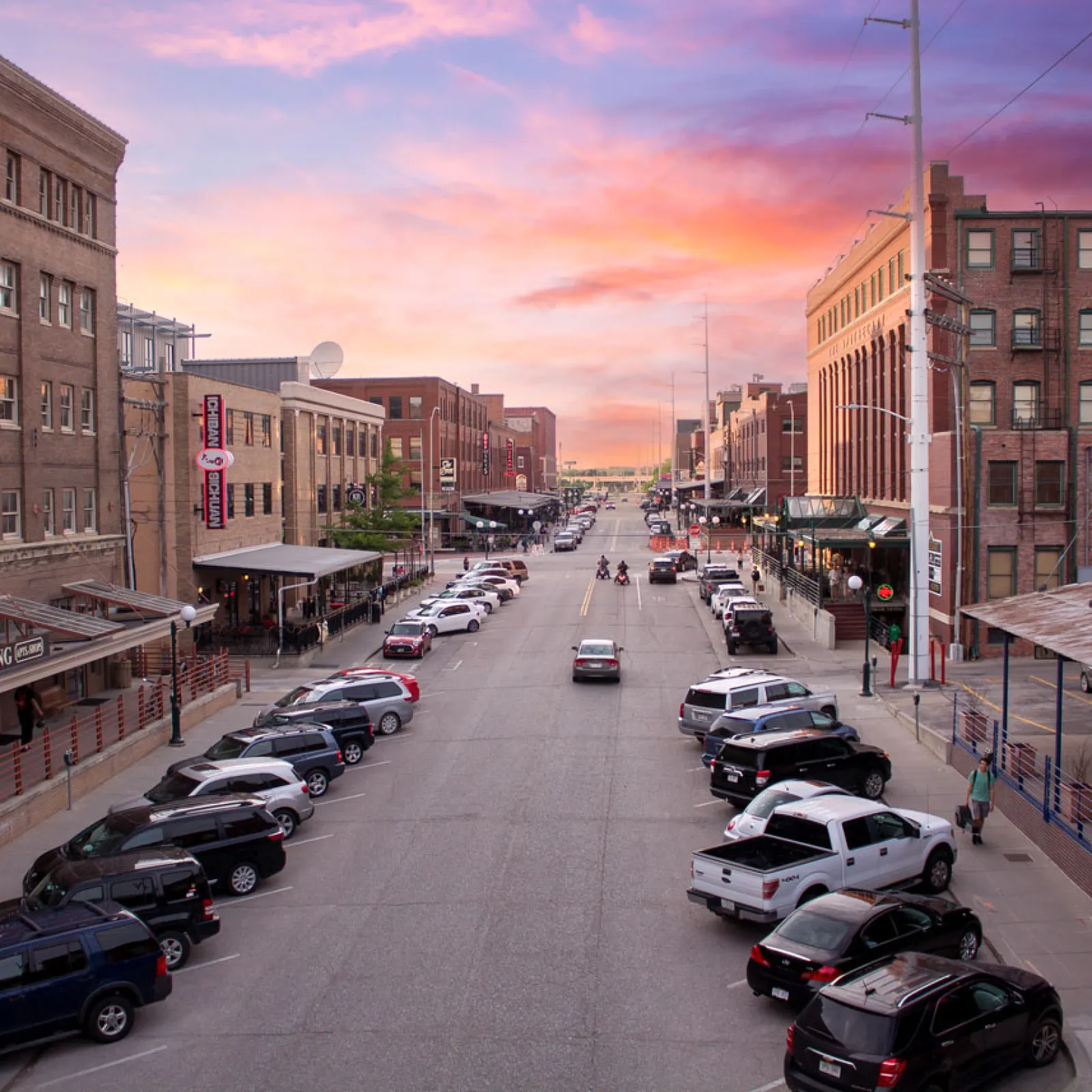 a street with cars parked along it