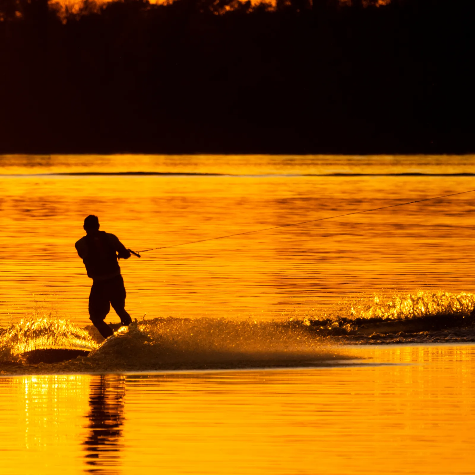 a man surfing on the waves