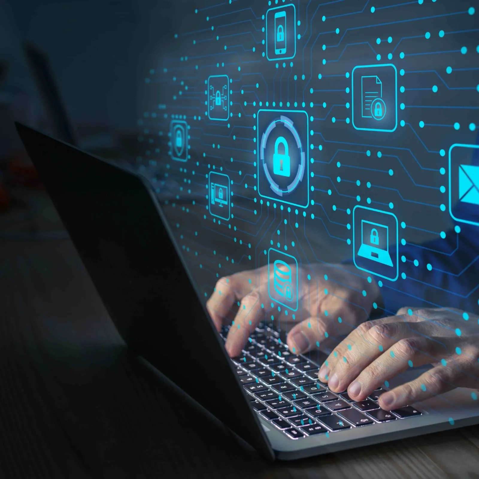 a person typing on a laptop