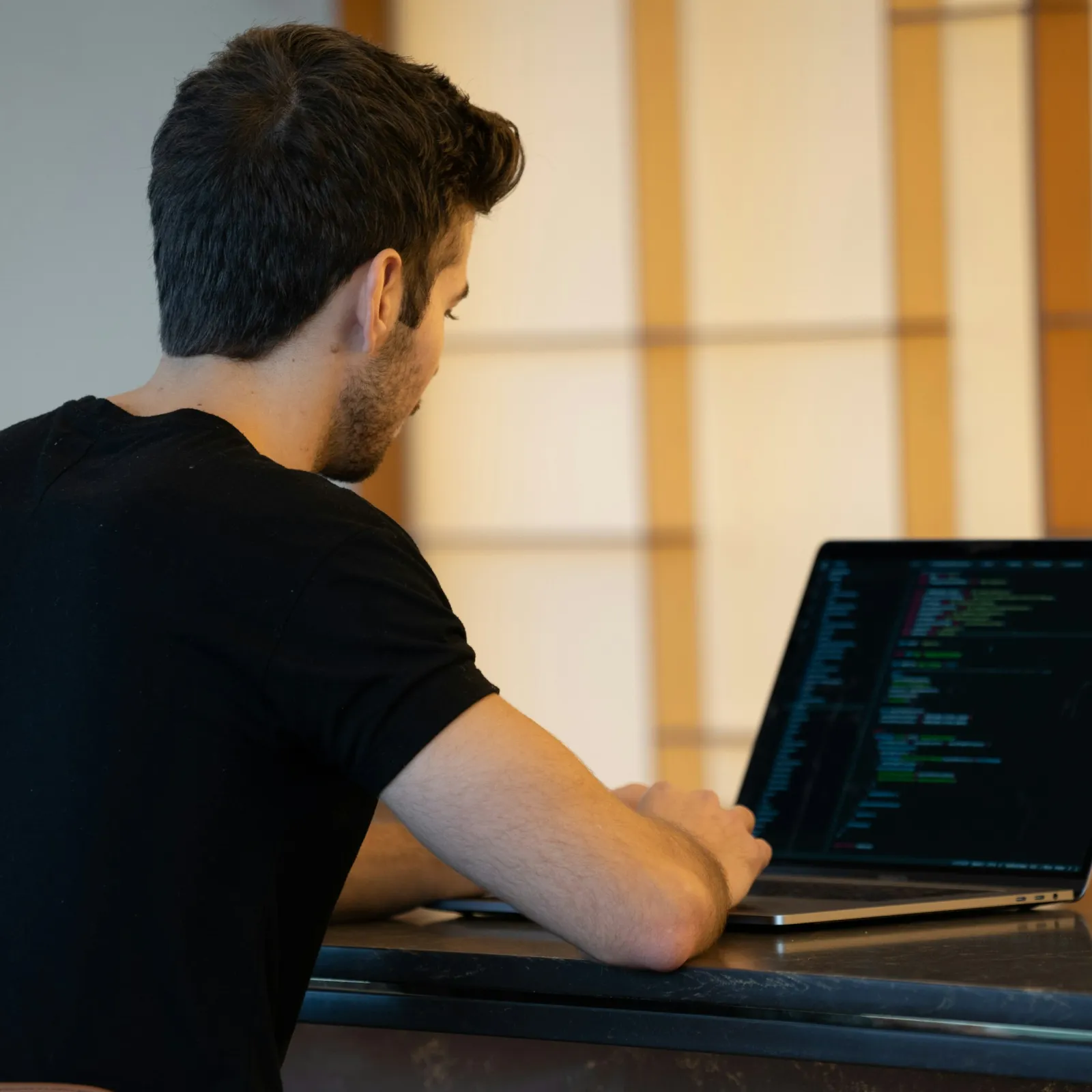 a man using a laptop