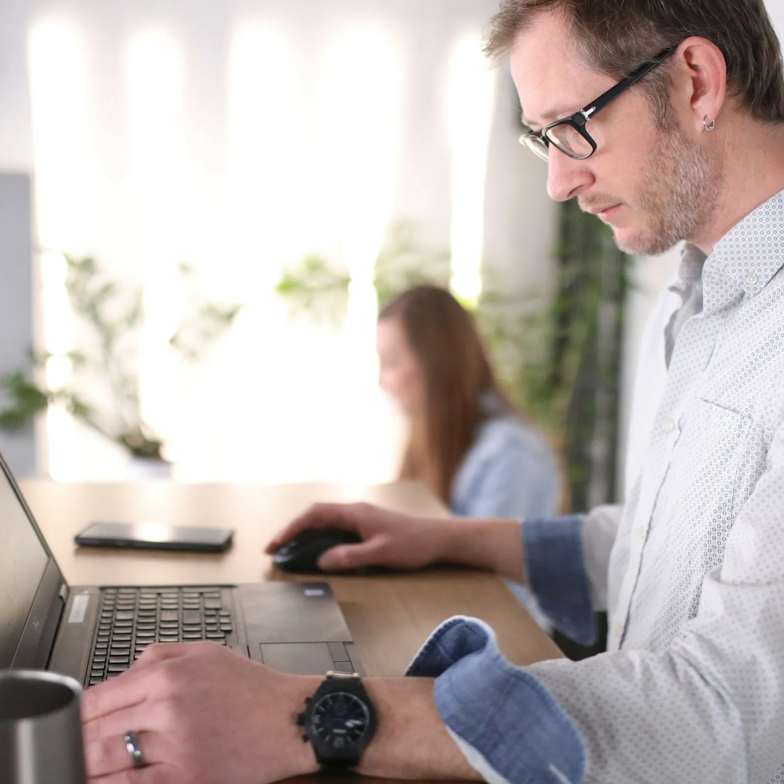 a man using a laptop