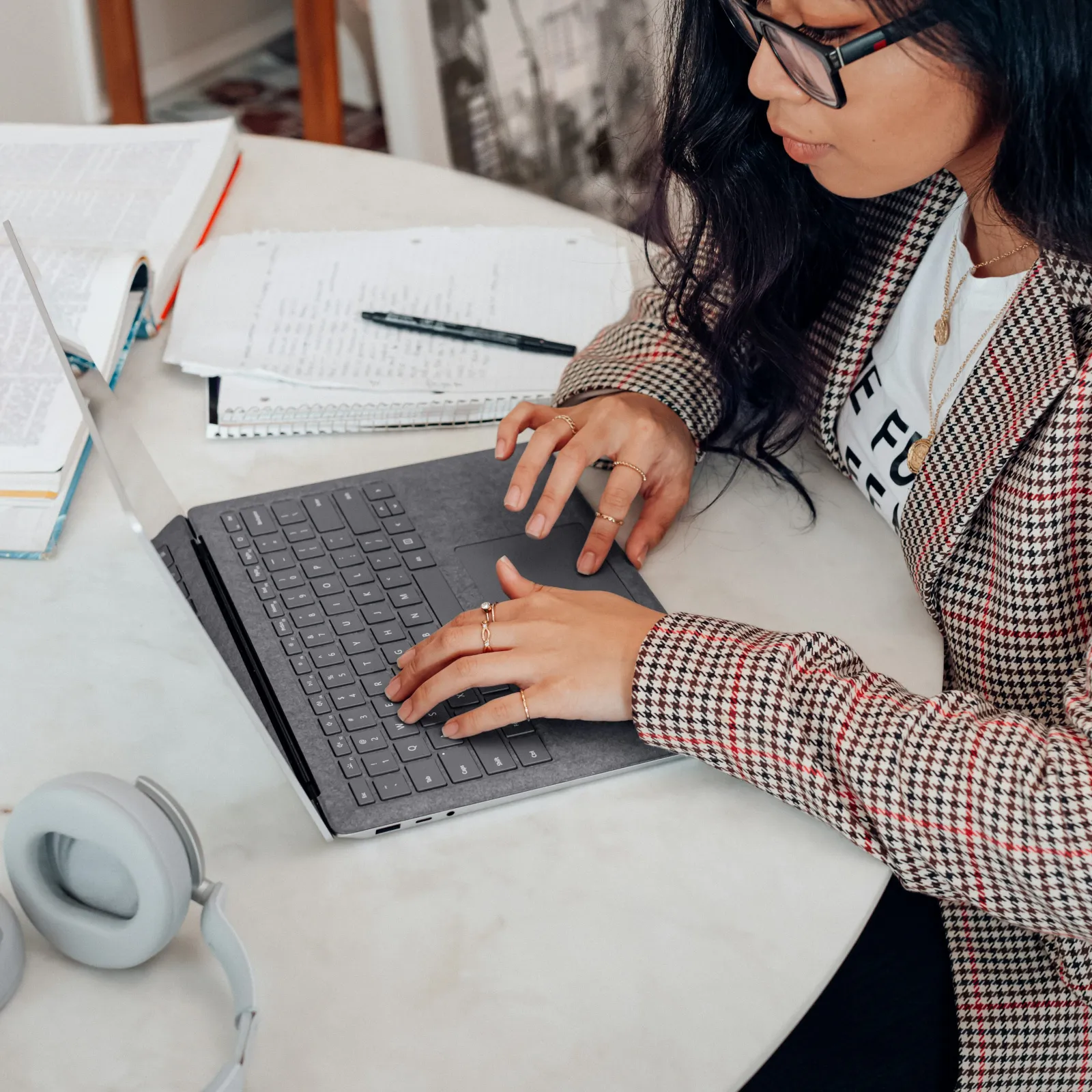 a woman using a laptop