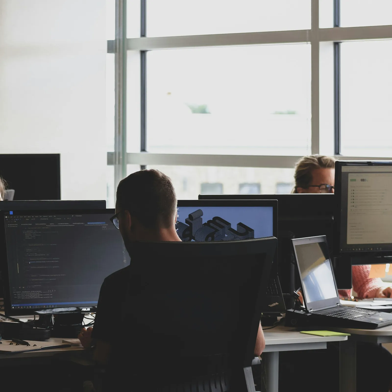 people sitting at computers