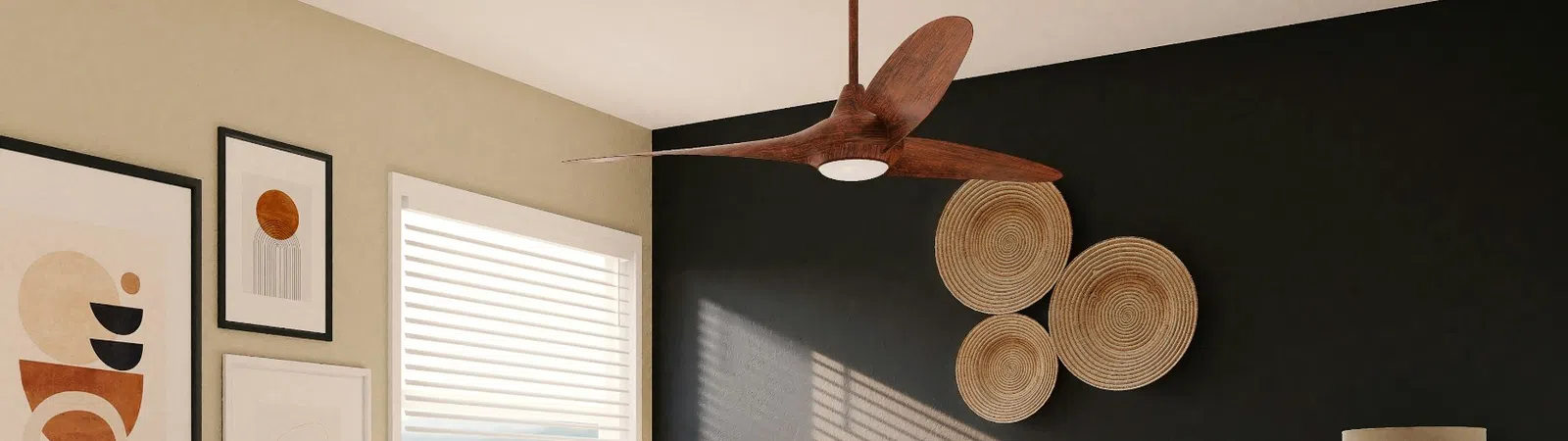 Modern bedroom featuring a stylish ceiling fan, artwork, and neutral color scheme for a cozy atmosphere.