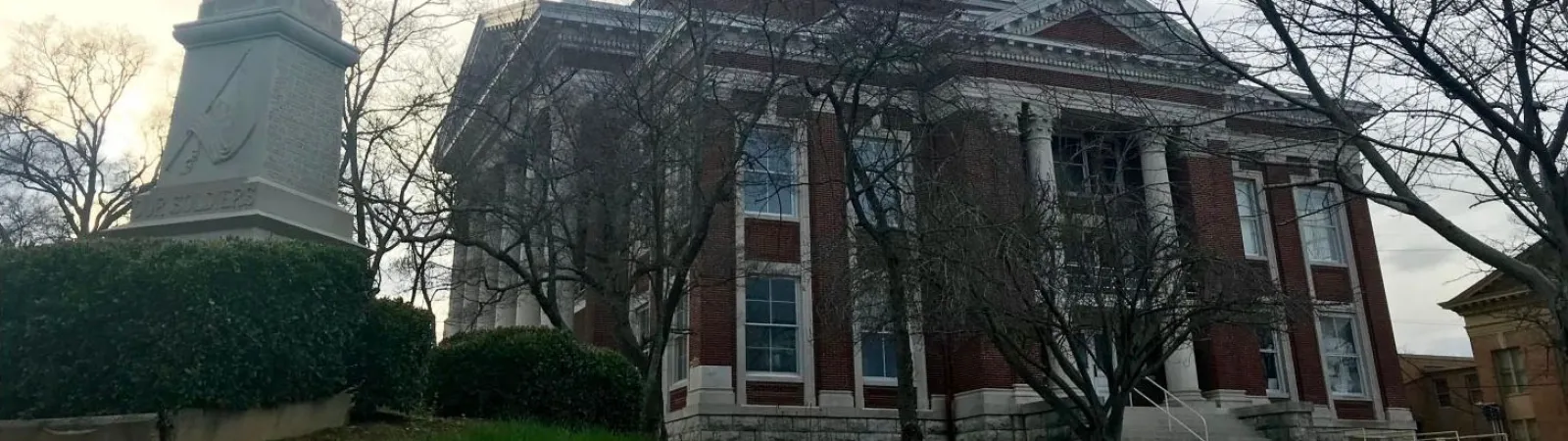 a large lawn in front of a building