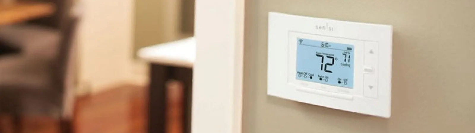 a thermostat on a wall