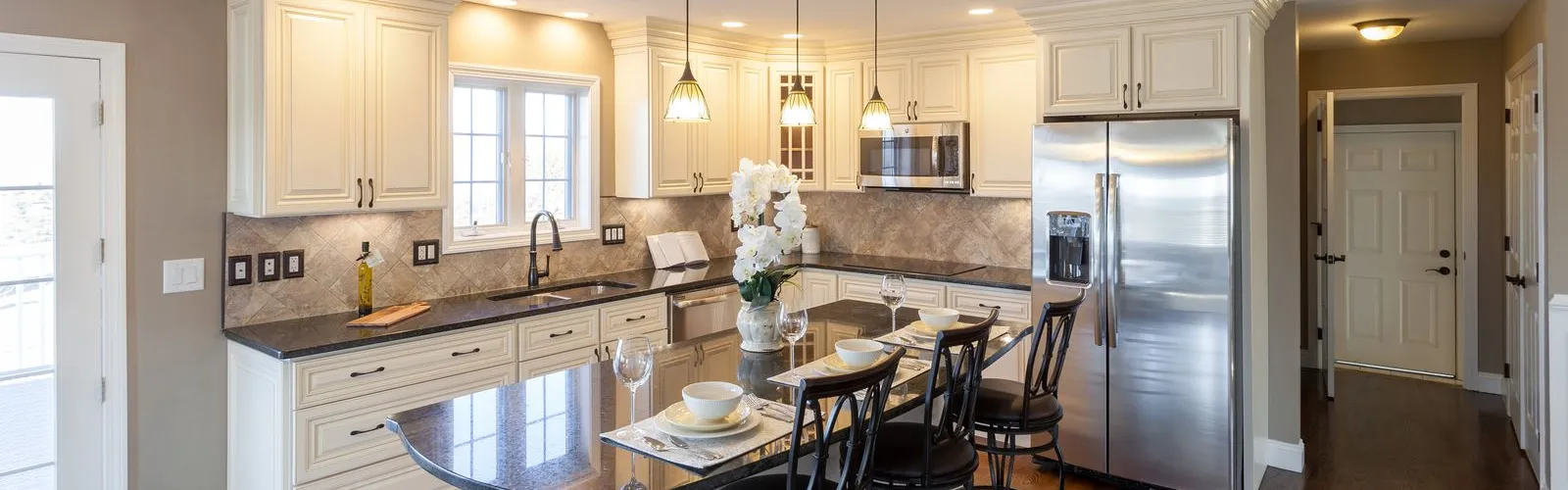 a kitchen with a dining table