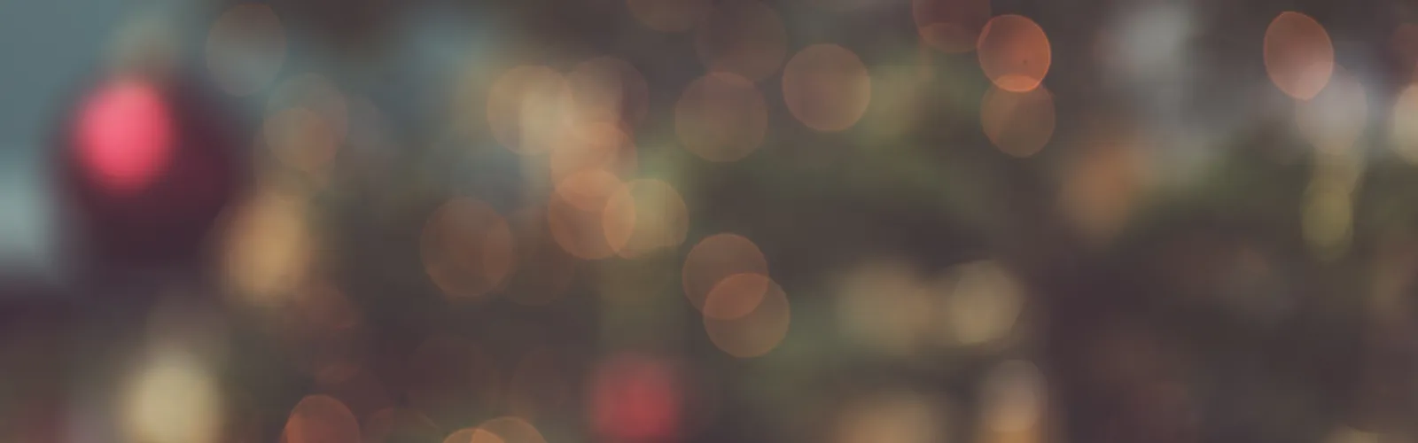 Blurred Christmas lights on evergreen tree