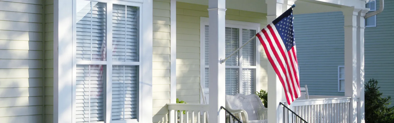 american flag on a front porch