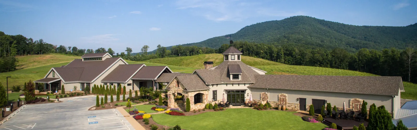 a house with a mountain in the background