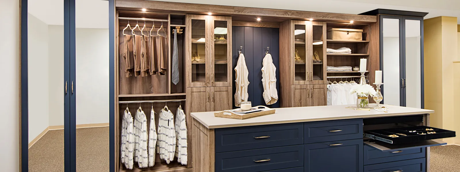 a custom closet with blue accents
