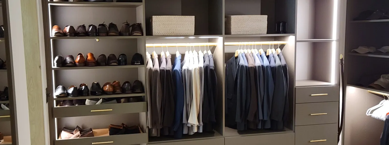 a closet with a variety of clothes
