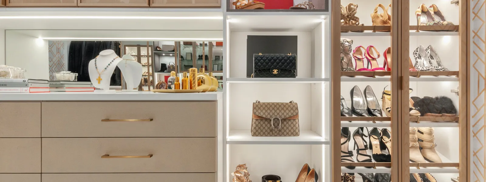 a luxury closet with designer shoes handbags and jewelry