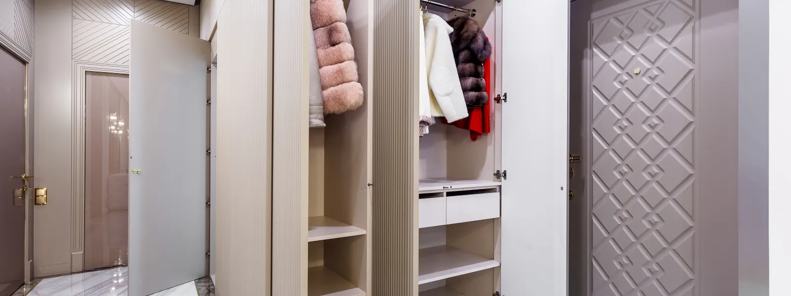 a closet with clothes