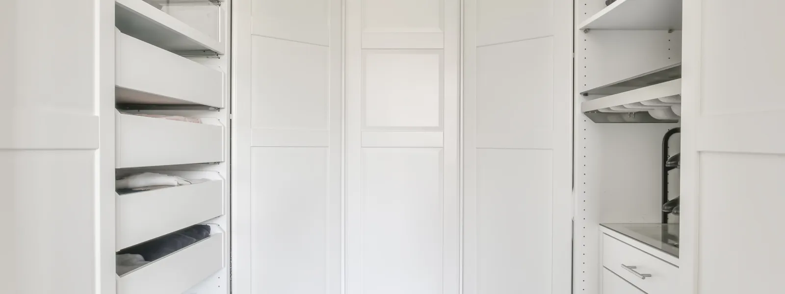 a white room with white shelves
