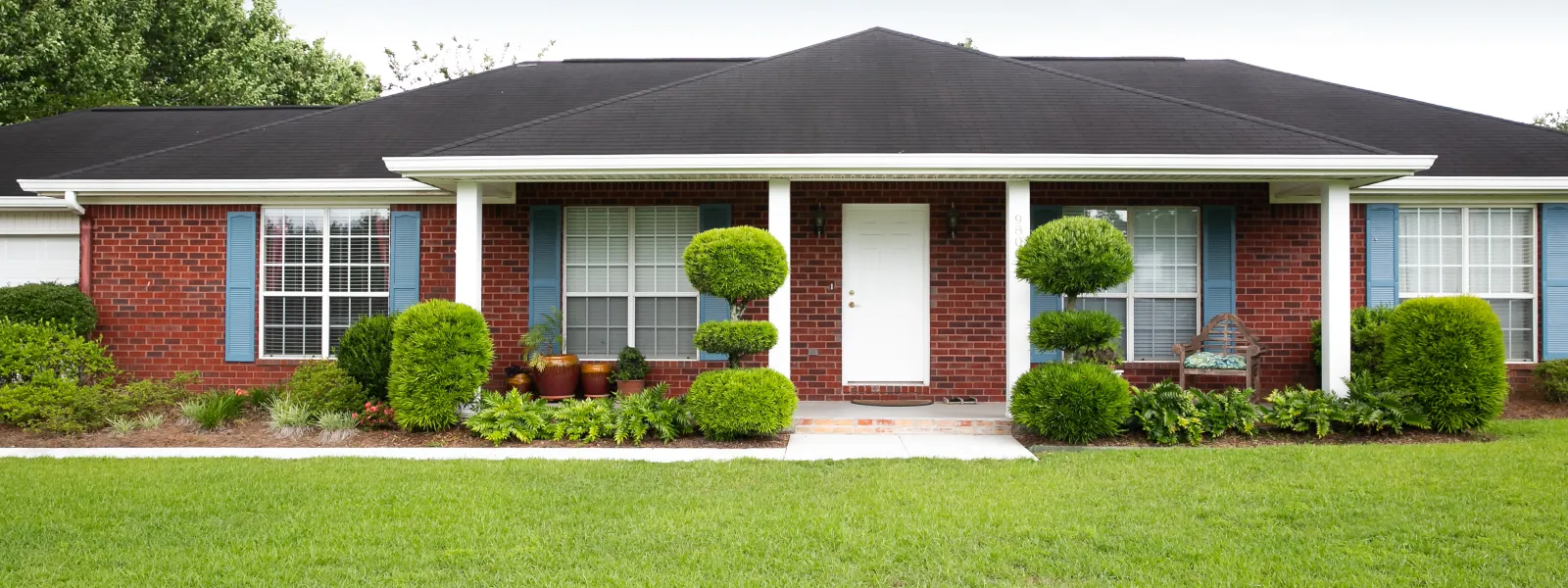 a large lawn in front of a house