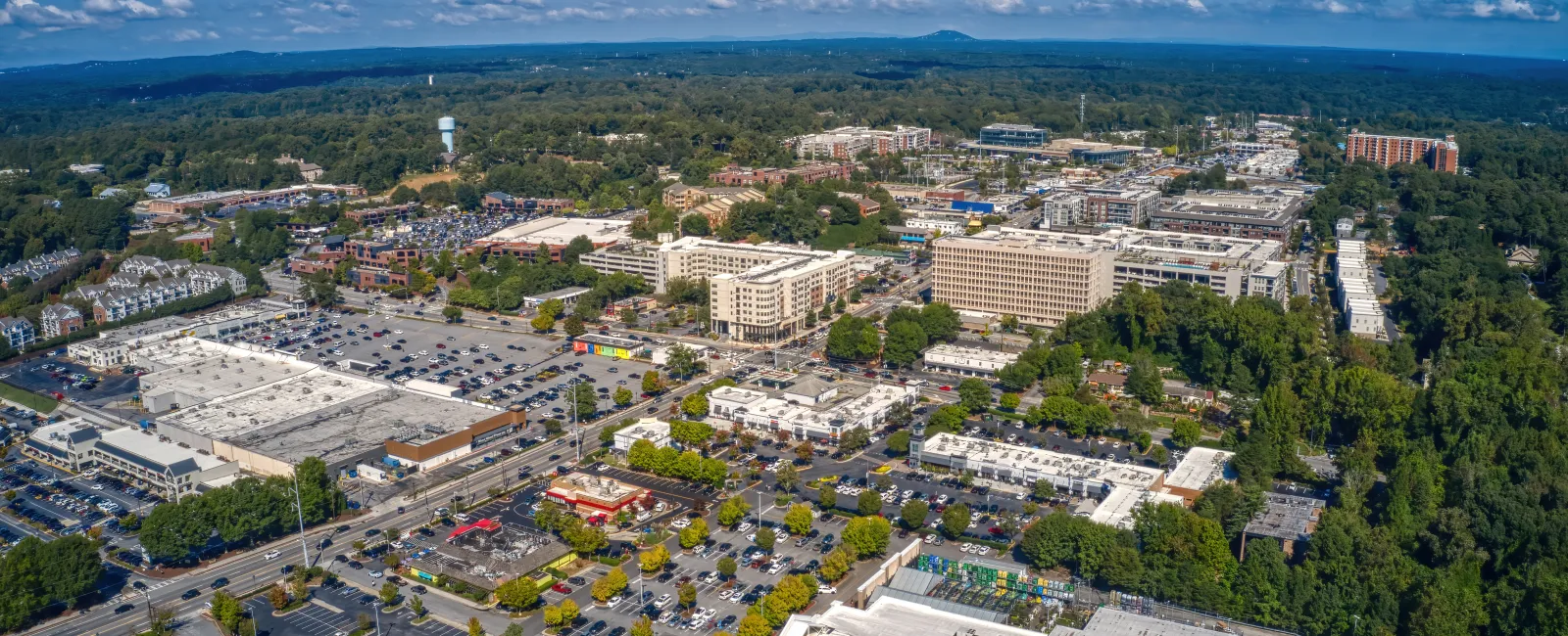 a city with many buildings and trees