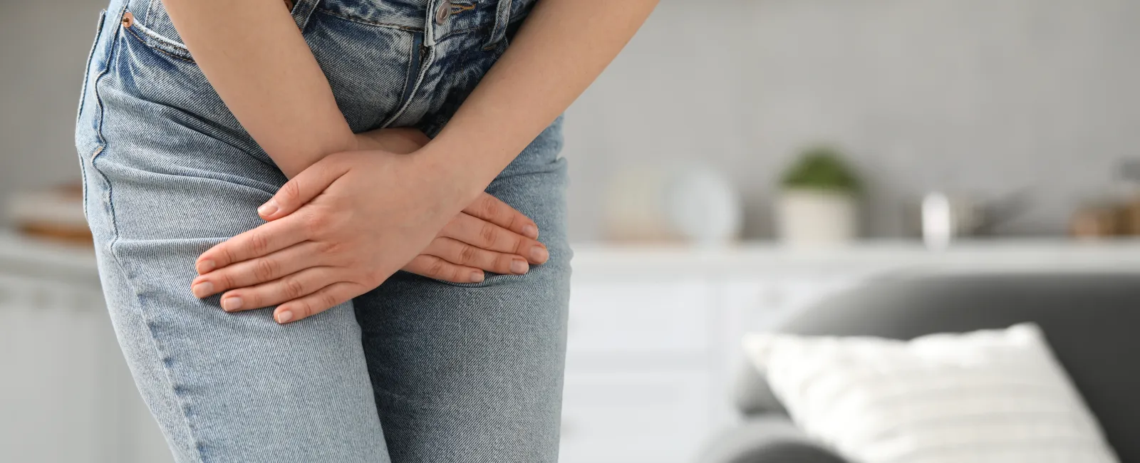 a woman suffering from a UTI