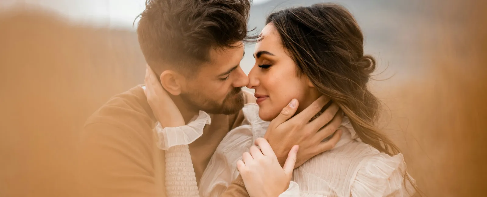 a man and woman kissing