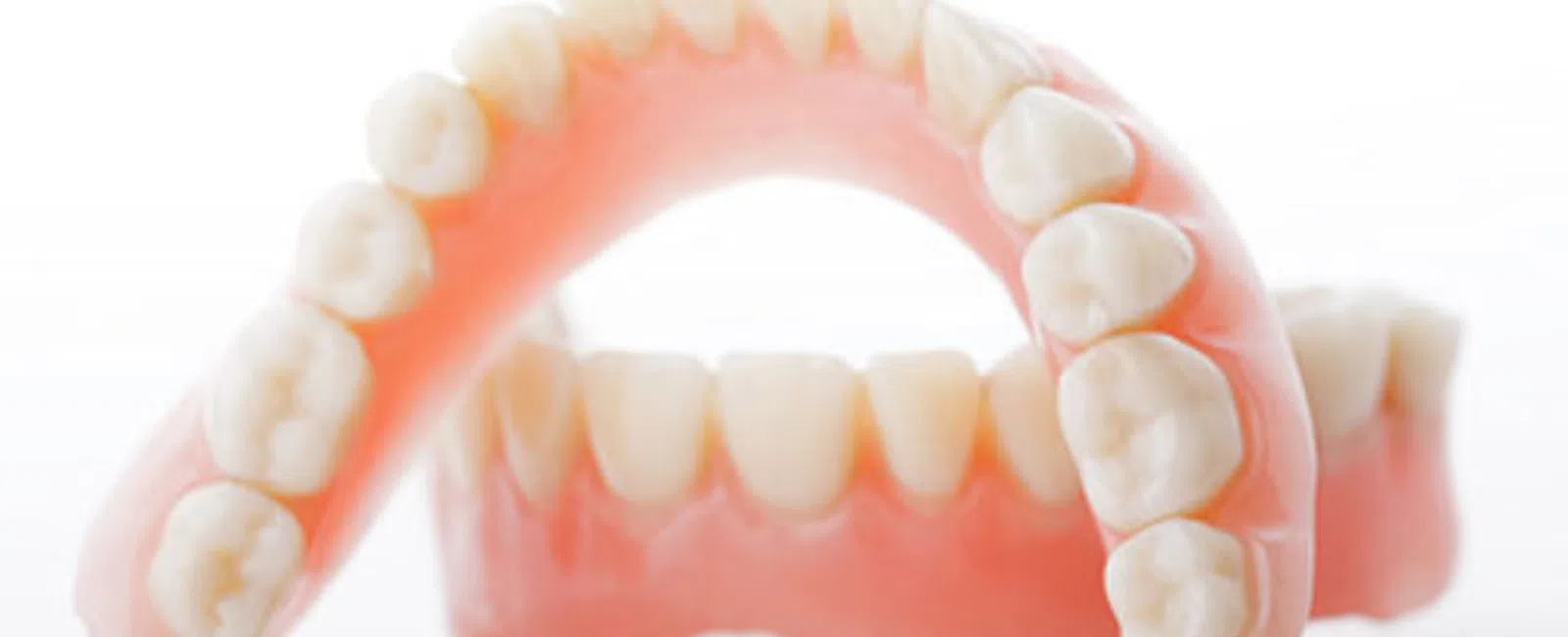 Implant Dentures vs. Regular Dentures: What You Need to Know