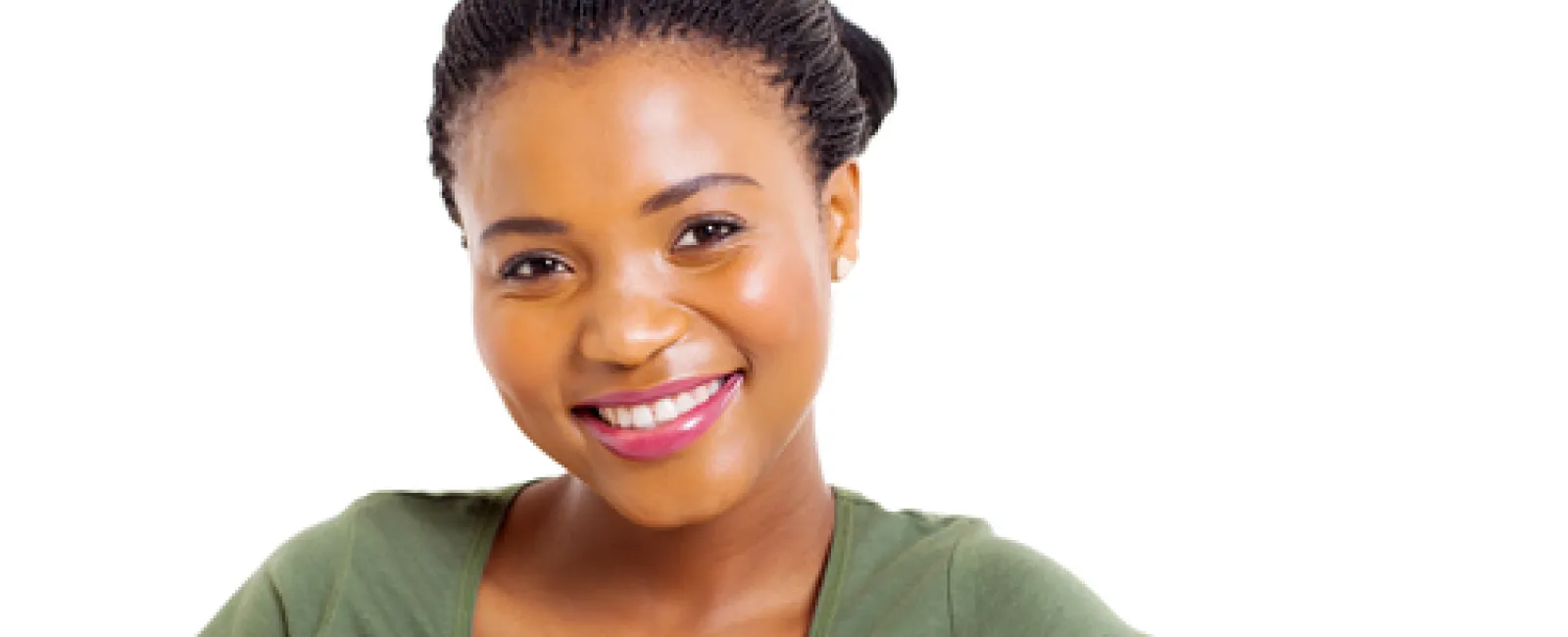 Smiling young woman with braided hair wearing a green t-shirt against a white background