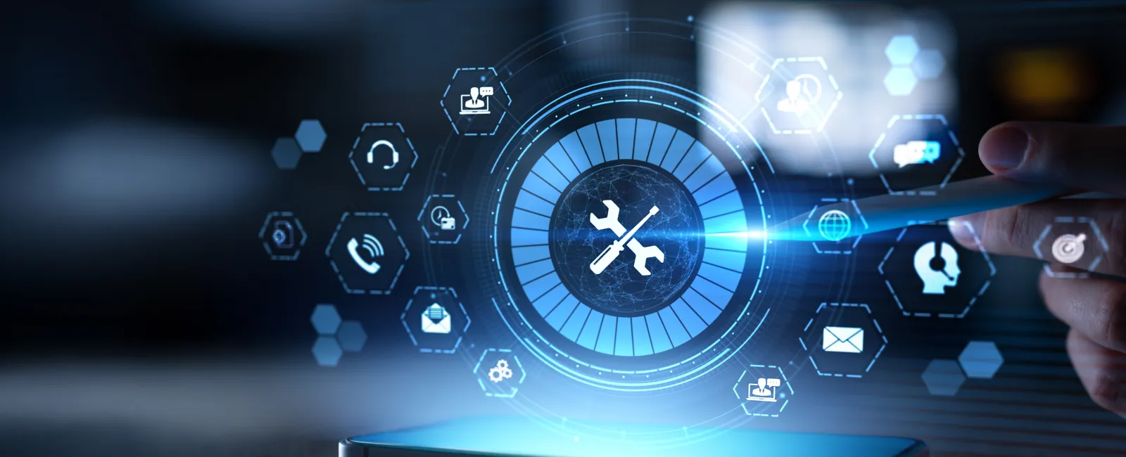 Hand holding stylus near smartphone displaying glowing digital technology and service icons hologram on dark background