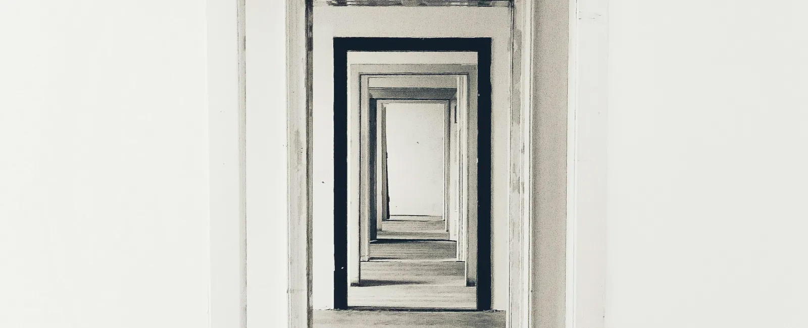 A series of white doorways creating a visual tunnel effect in a minimalistic empty space.