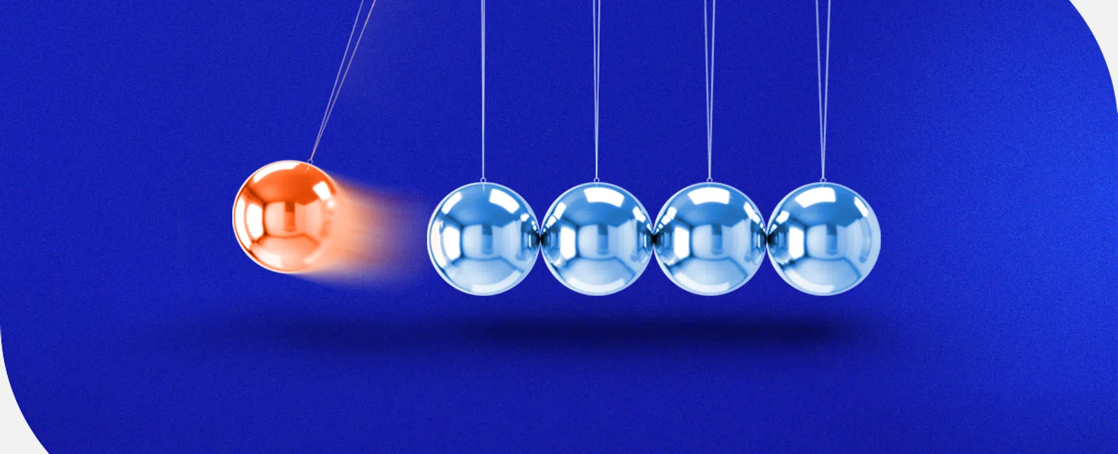 Orange ball swinging to hit four blue metallic balls in a Newton's cradle on a vibrant blue background