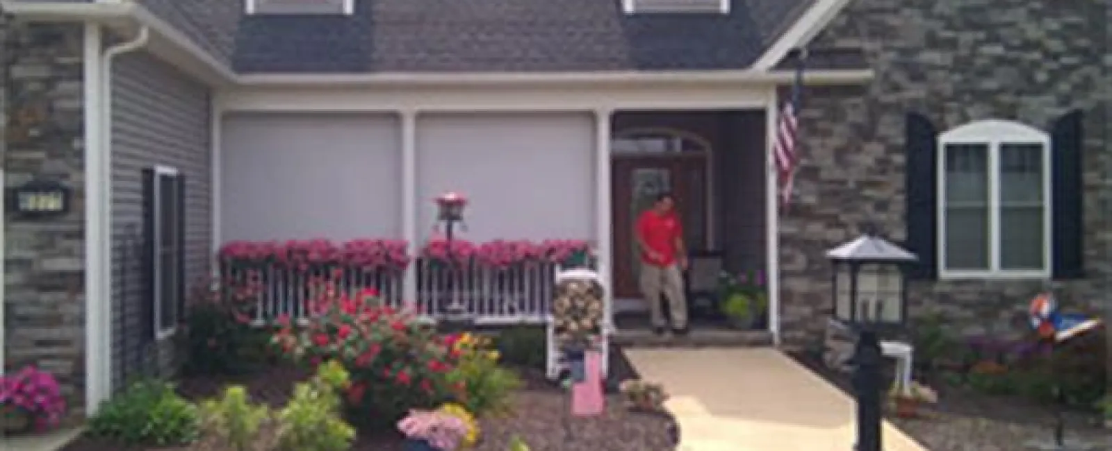 a person standing in the doorway of a house