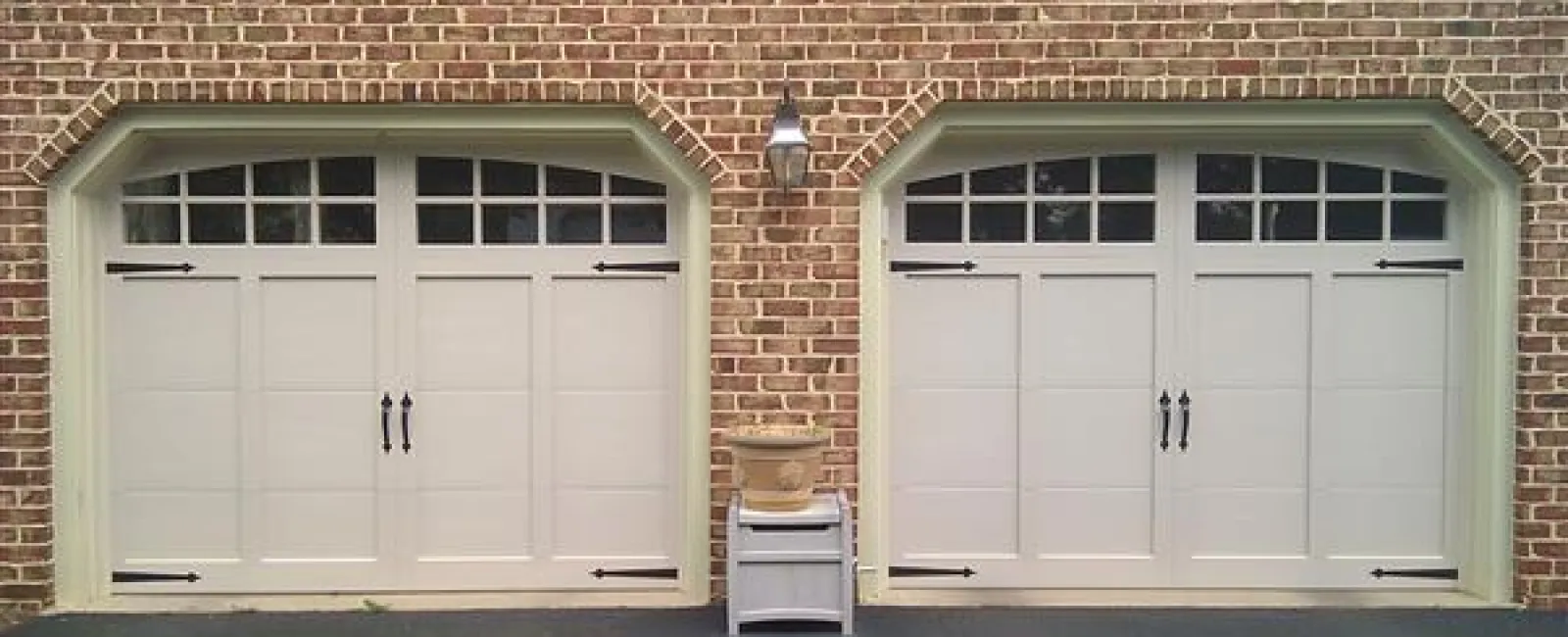 a brick building with white doors