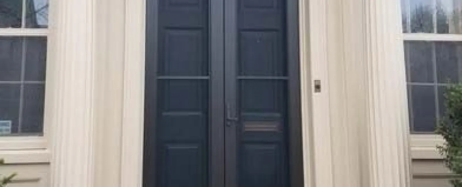 a black door on a building