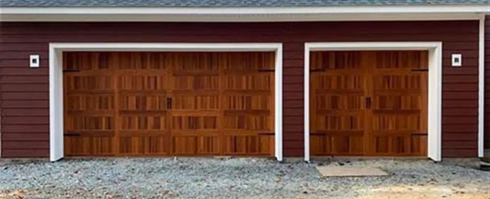 a red barn with a garage door