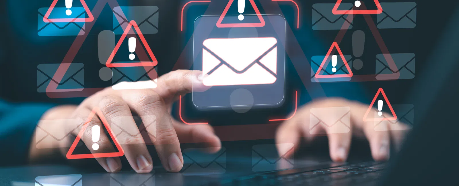 Person interacting with laptop surrounded by email icons and red warning symbols indicating email alerts or security.